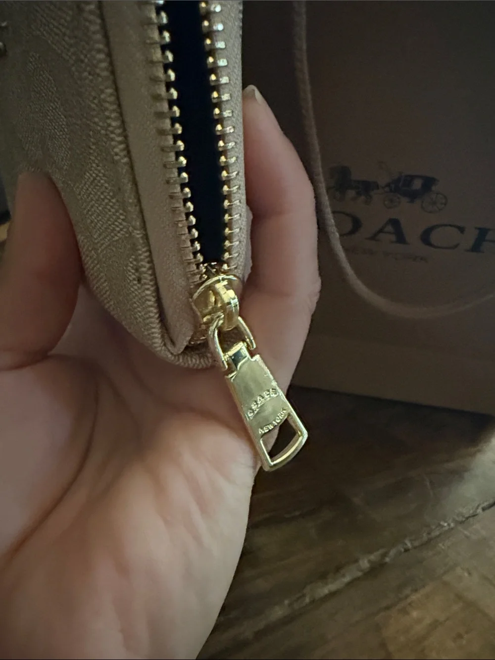 Coach Signature Zip Wallet in Light Beige with Gold Hardware